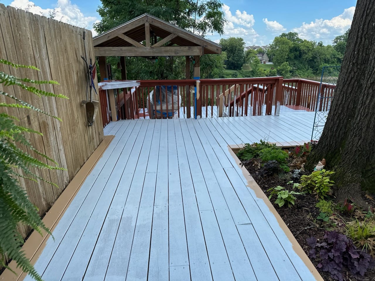 Deck before — faded gray deck before Lopez Painting staining